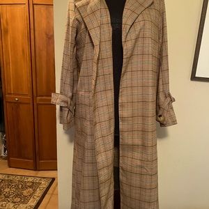Plaid trench coat when pockets. Very slimming.